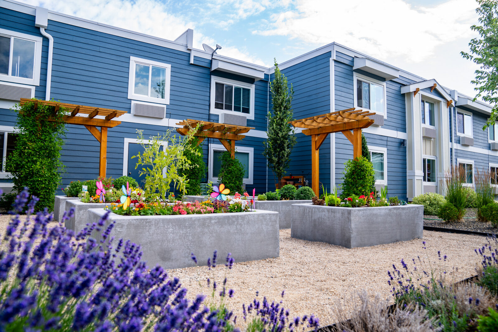 exterior building with raised garden beds