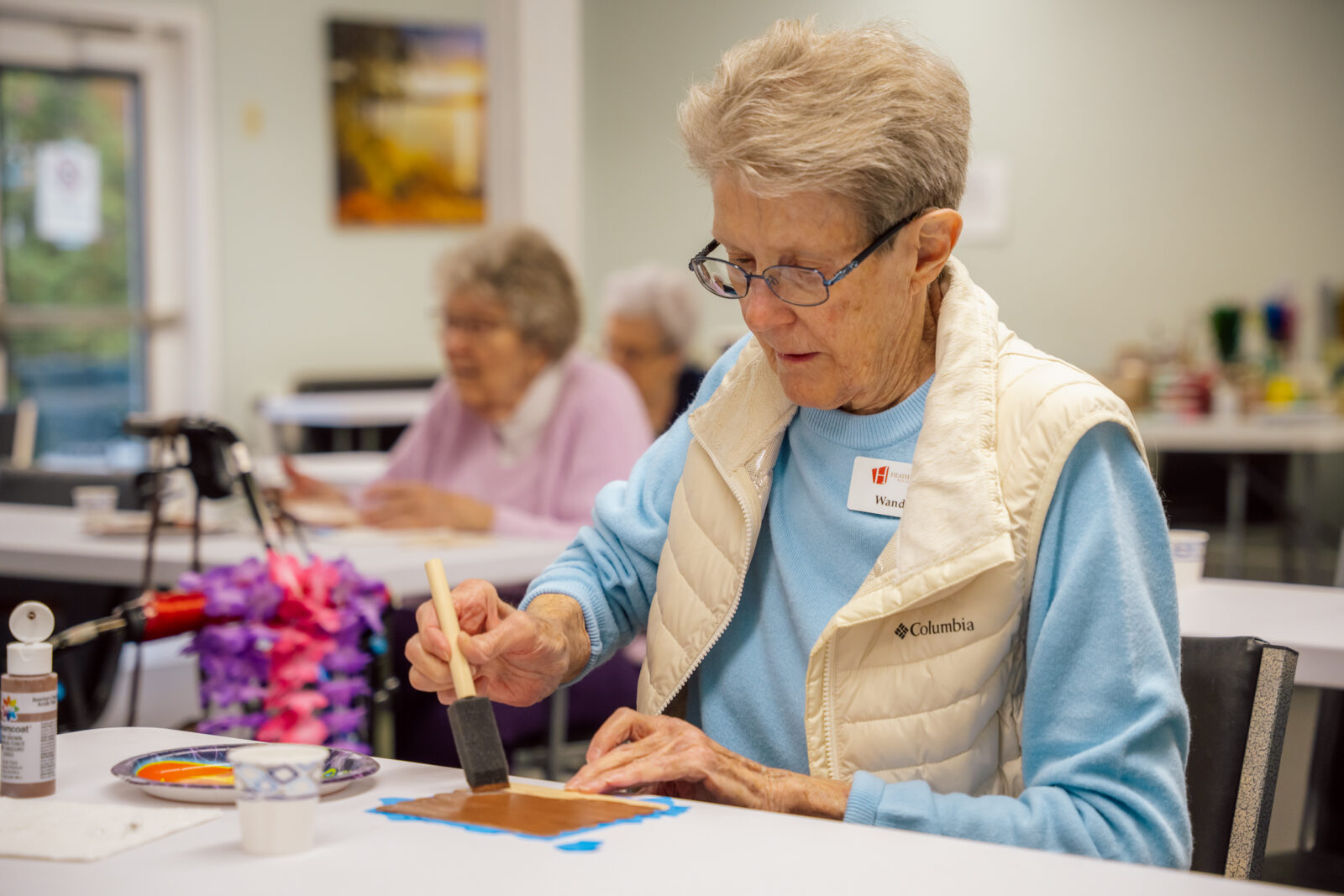 senior woman working on craft project