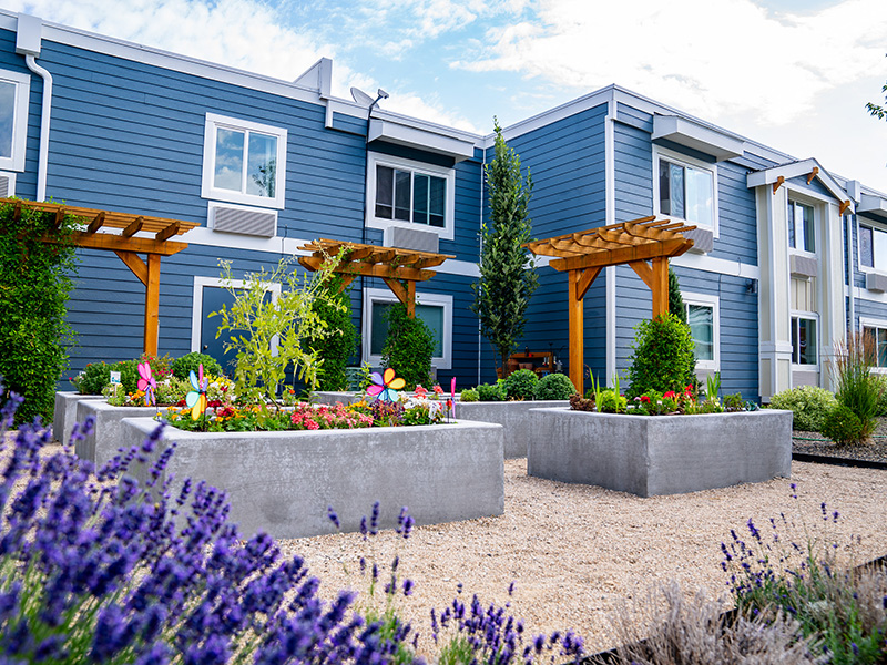 exterior of building with raised flower beds