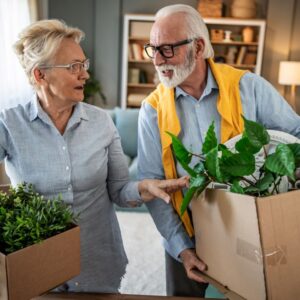 An older woman and man move into a senior living community.